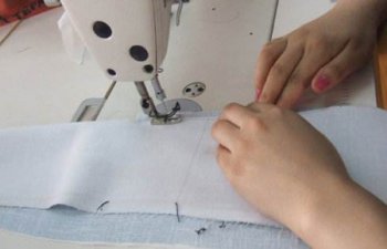 定做工作服生产当中的车缝倒回针有什么用？